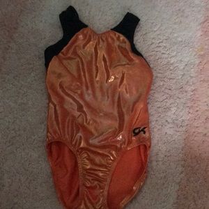 Orange and black GK gymnastics leotard
